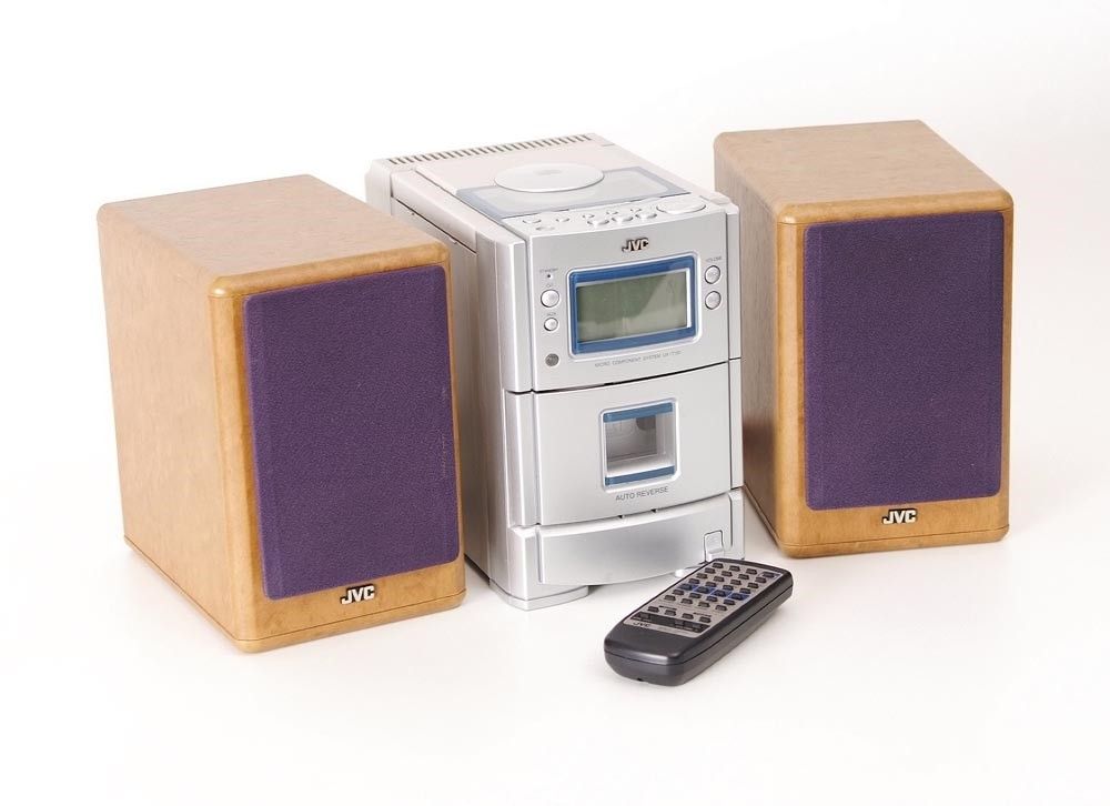 JVC micro hi-fi with CD and cassette decks and two wooden speakers - the first 'real' set