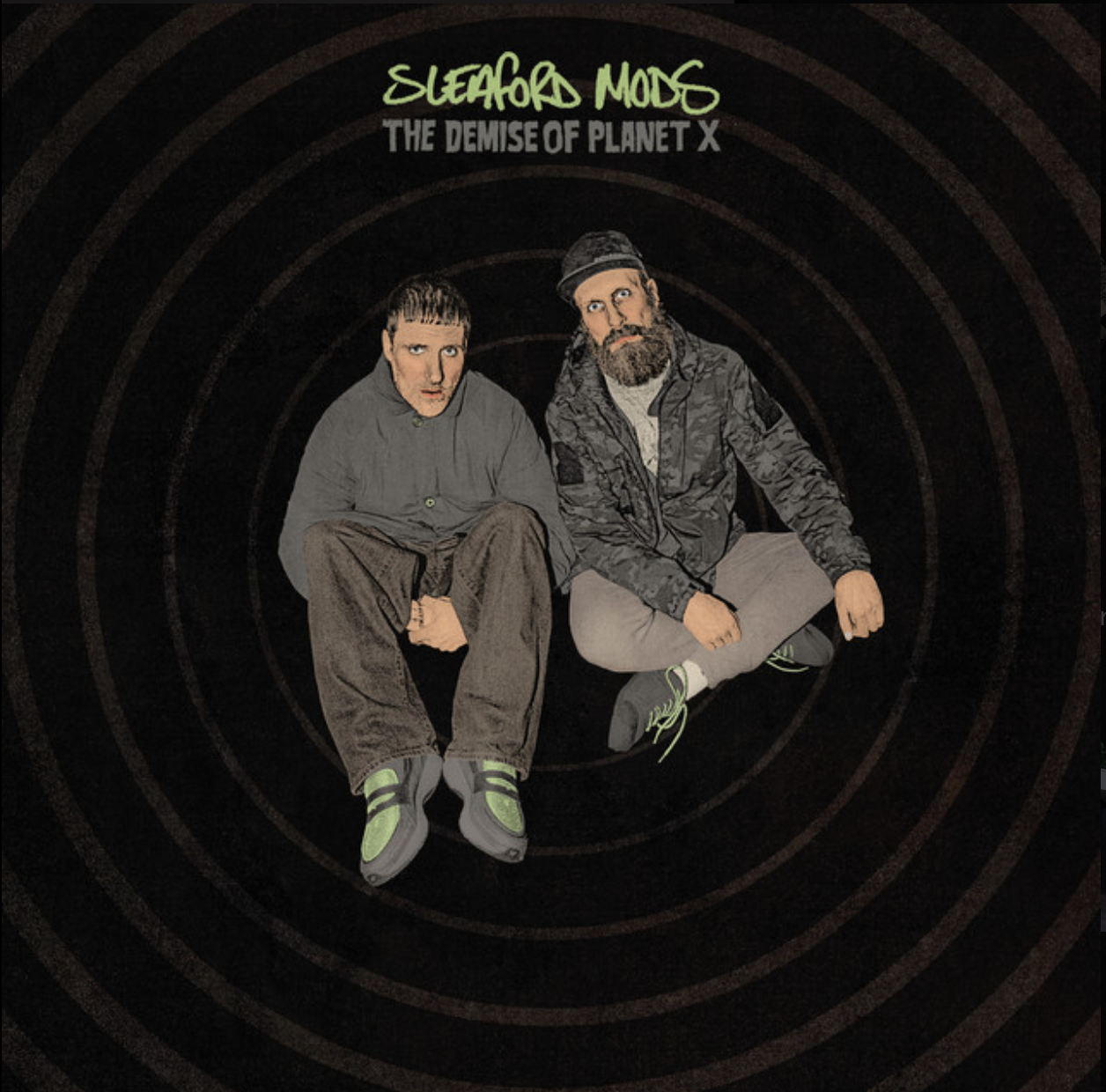Album cover for Sleaford Mods' The Demise of Planet X - the duo sitting against a dark spiral