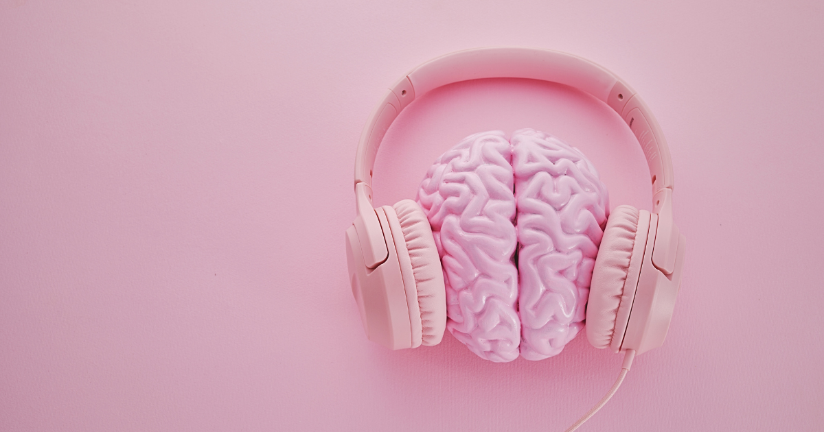 Pink model brain wearing pink headphones, for 'We'll Cure Your Musical Rut'