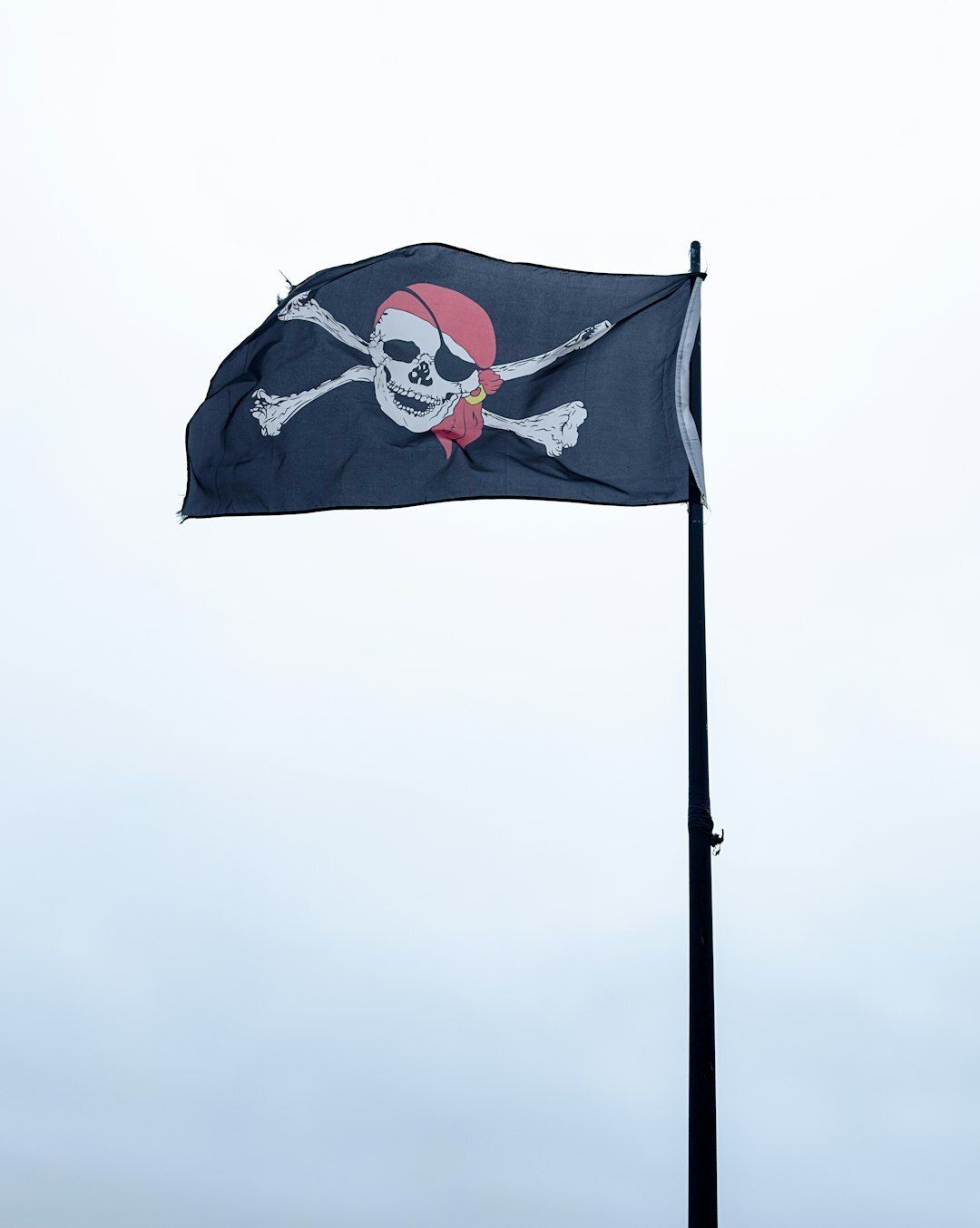 Jolly Roger flag flying in Swanage harbour
