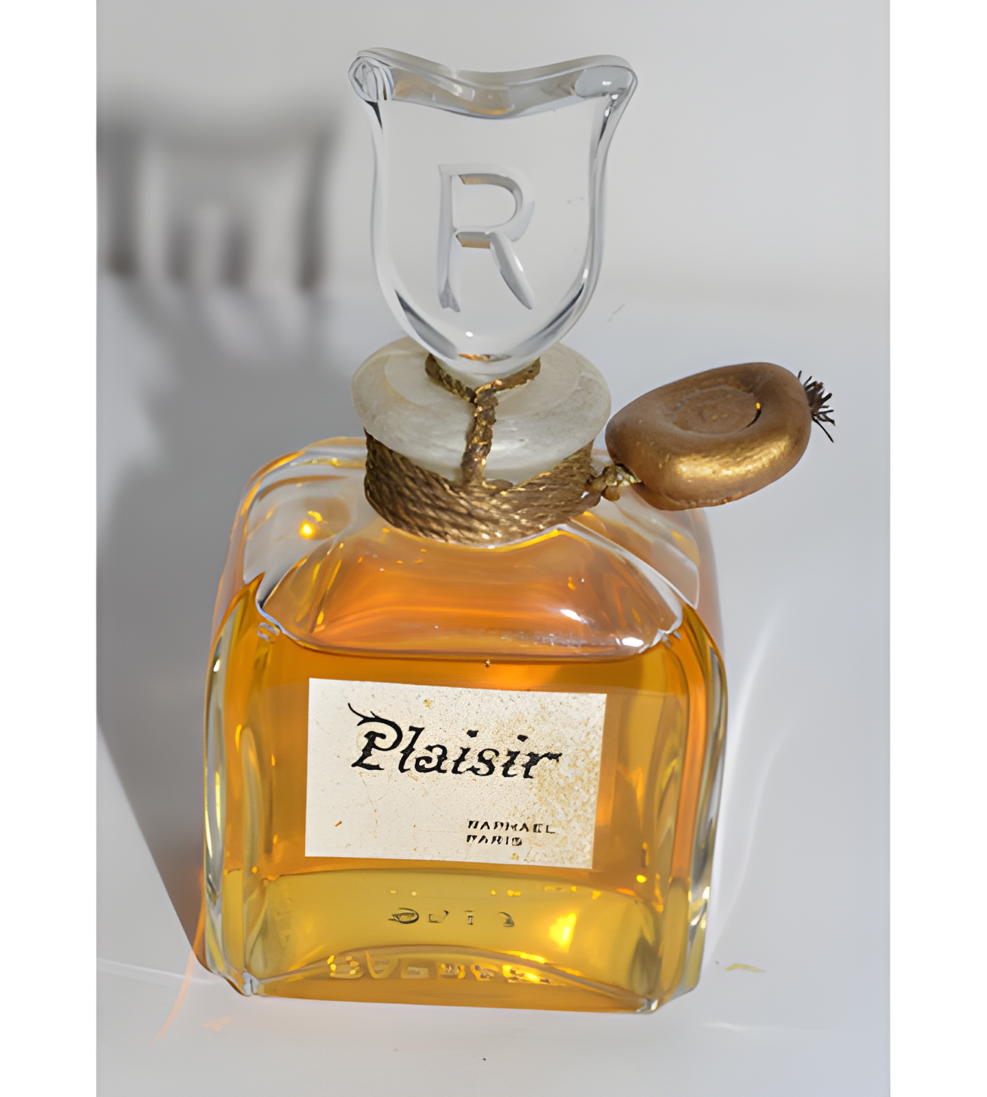 Plaisir by Raphael perfume bottle