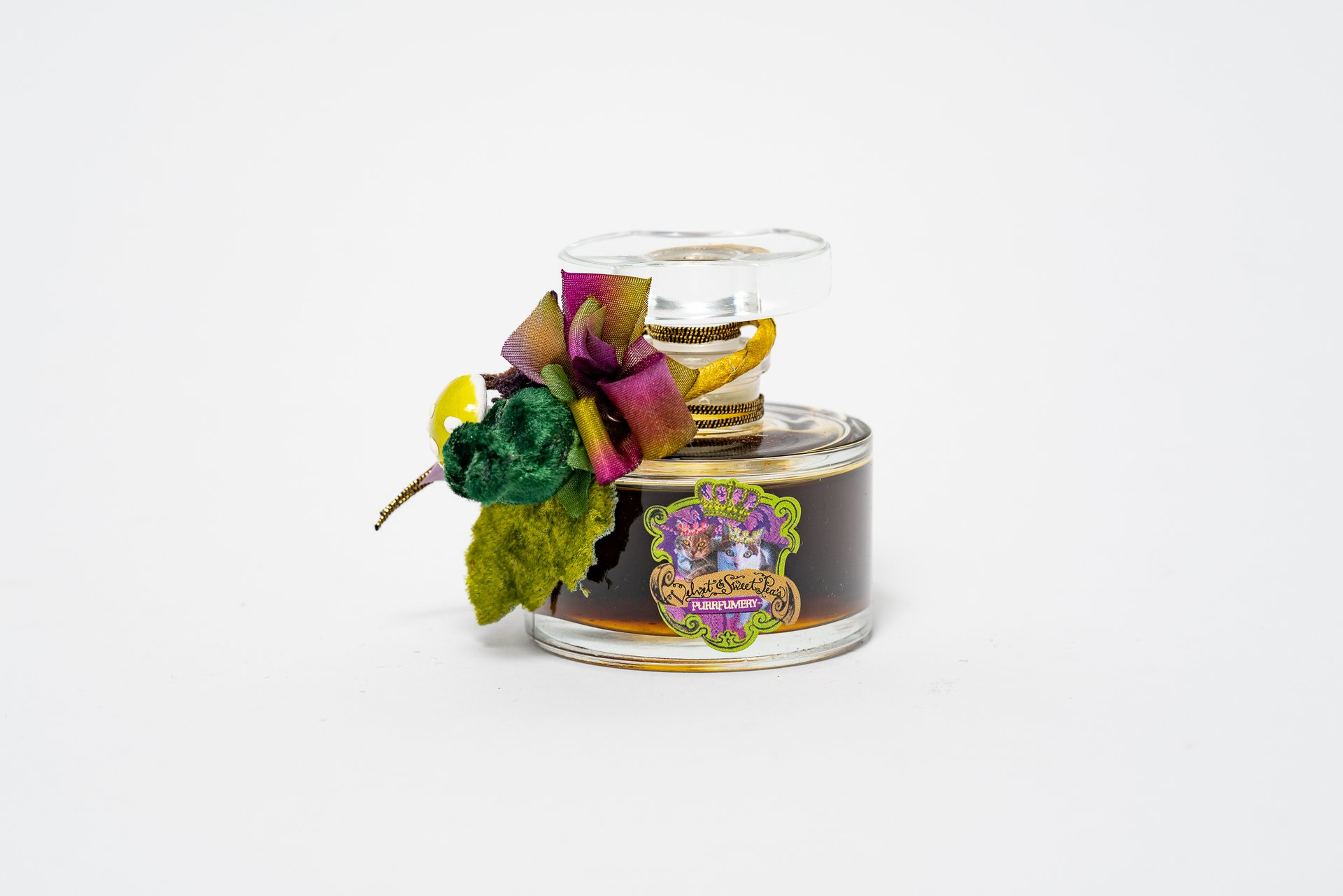 Pangolin Violette Rose by Velvet & Sweet Pea’s Purrfumery perfume bottle