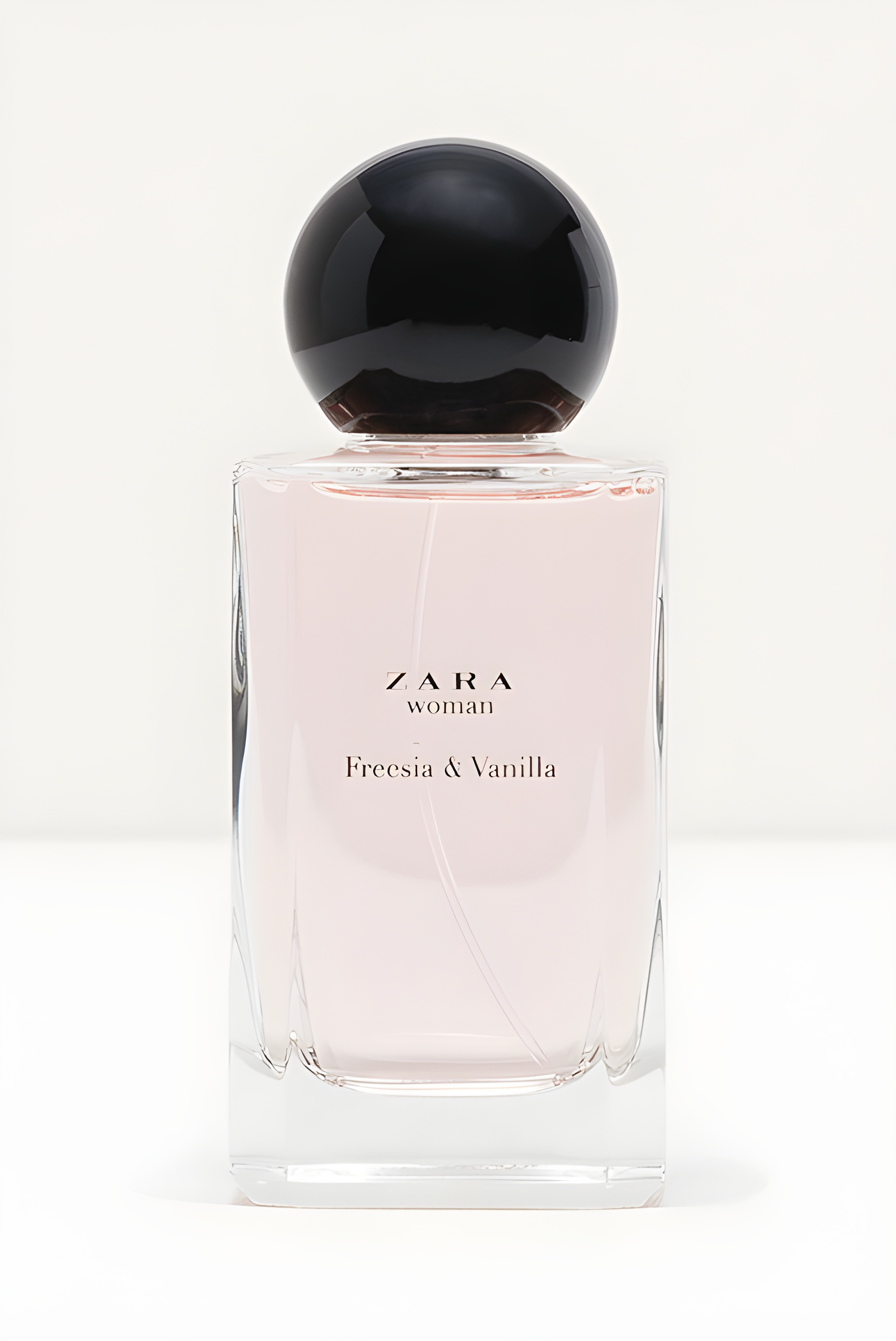 Zara Woman Freesia & Vanilla by Zara perfume bottle