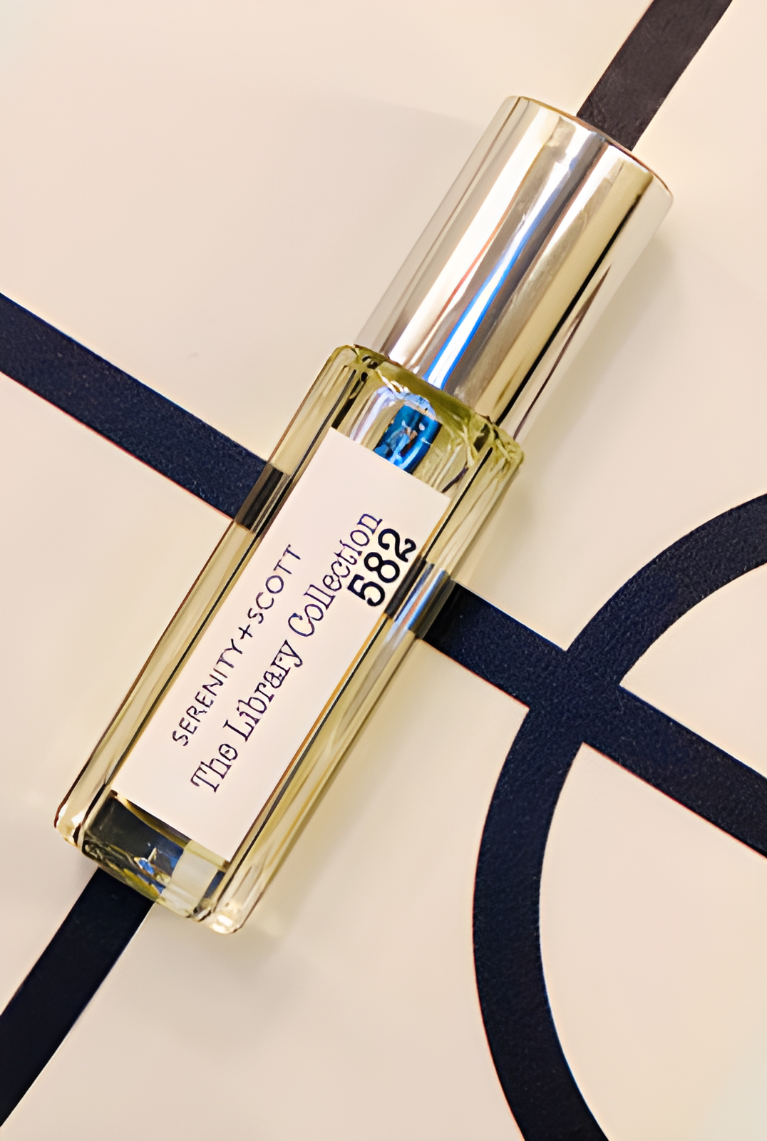 TLC582 by Serenity + Scott perfume bottle