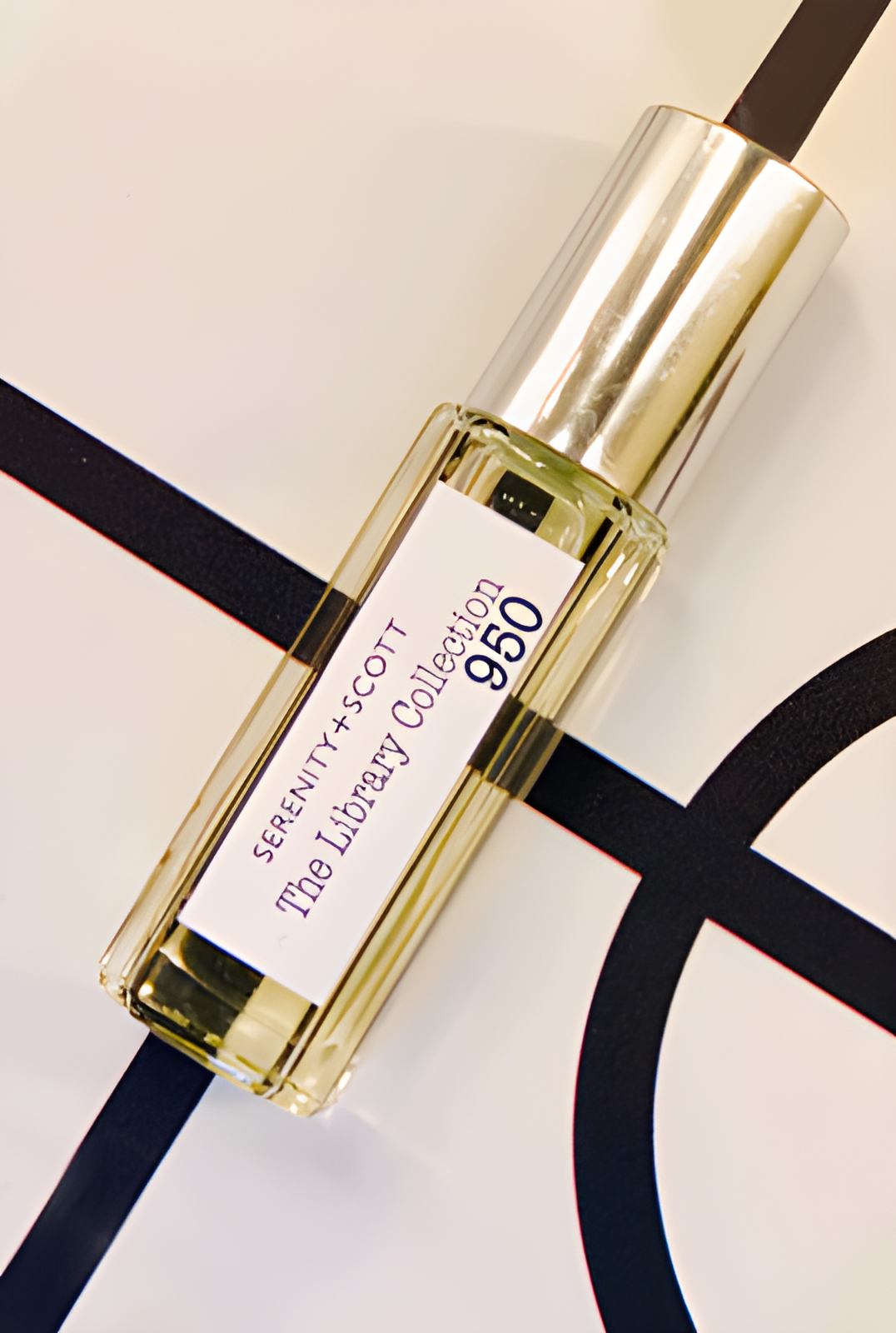 TLC950 by Serenity + Scott perfume bottle