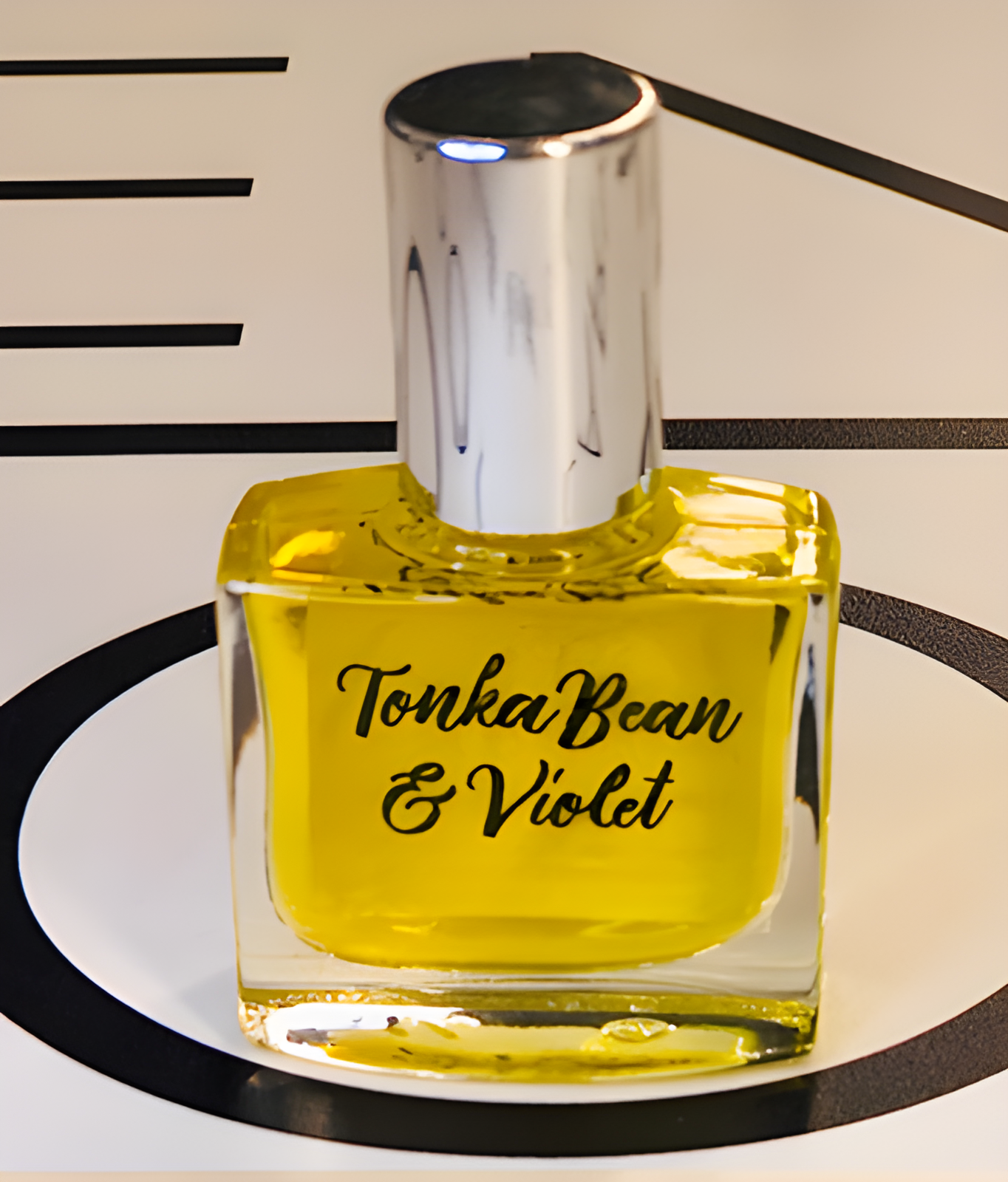 Tonka Bean & Violet by Serenity + Scott perfume bottle