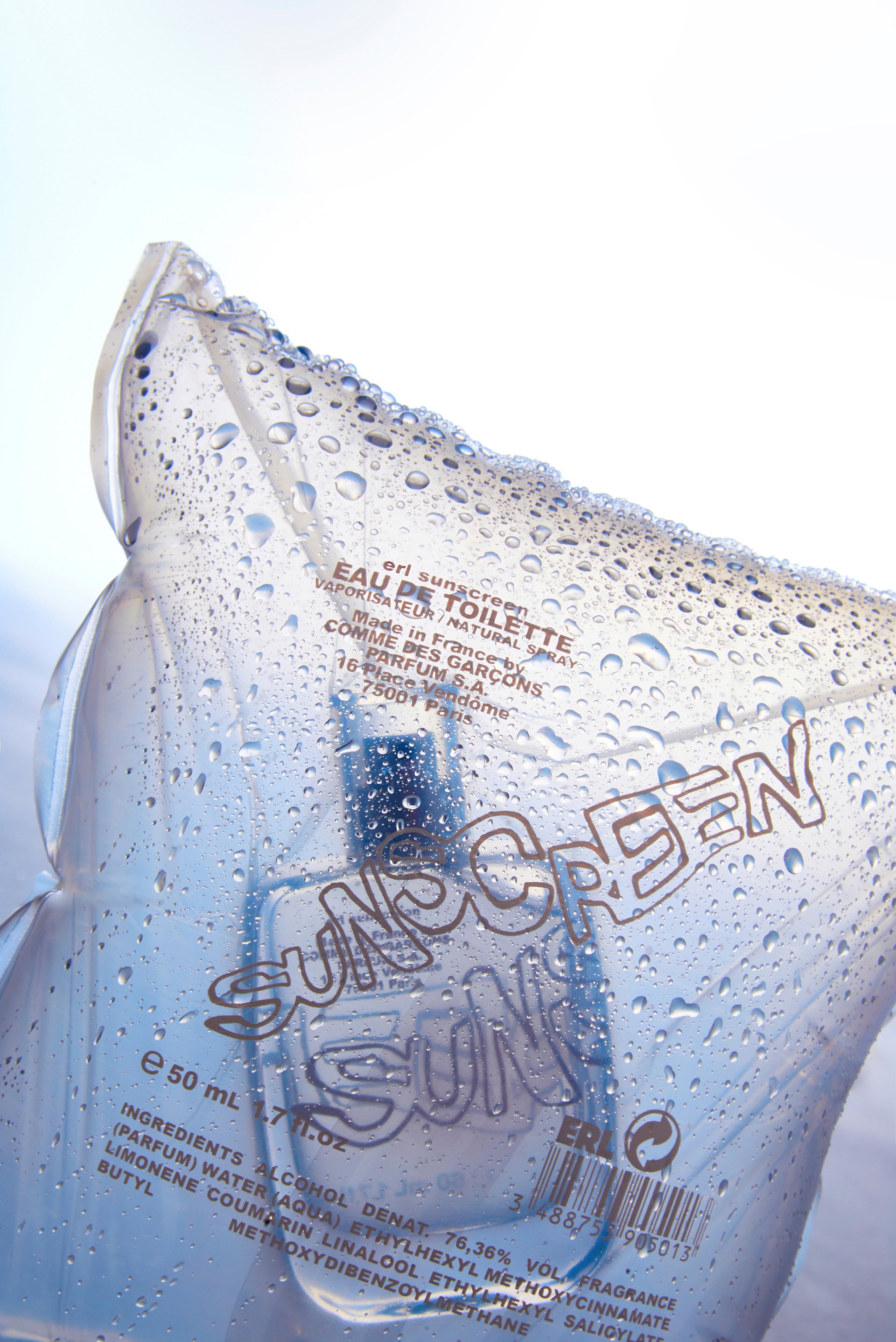 ERL Sunscreen by Comme des Garcons perfume bottle