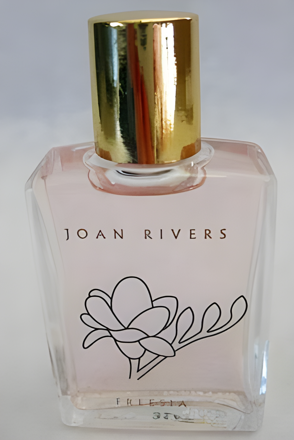 Freesia by Joan Rivers perfume bottle