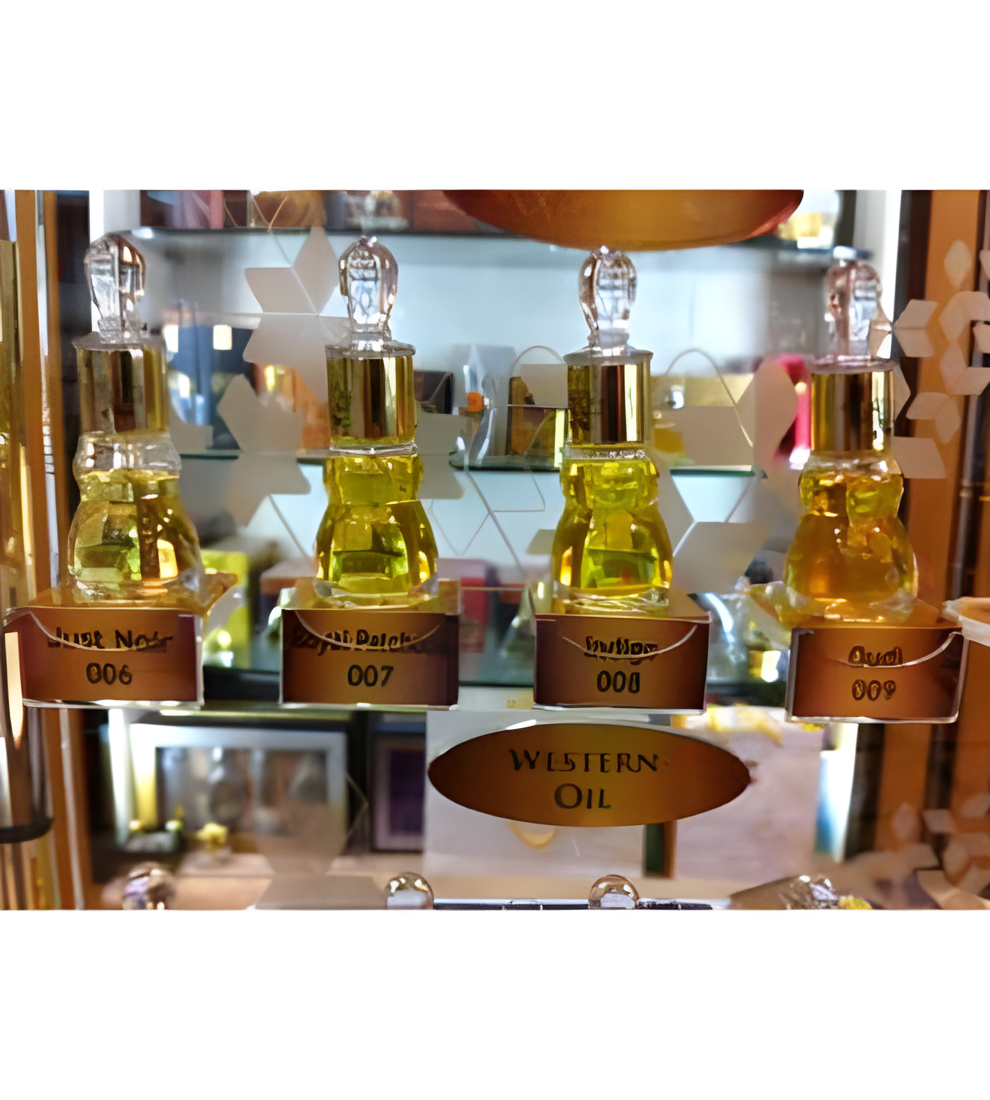009 Oudi by Ajmal perfume bottle