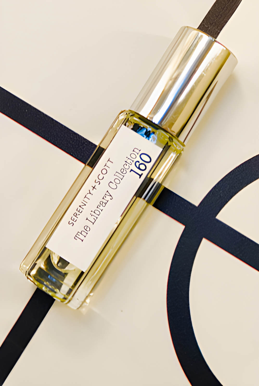 TLC160 by Serenity + Scott perfume bottle
