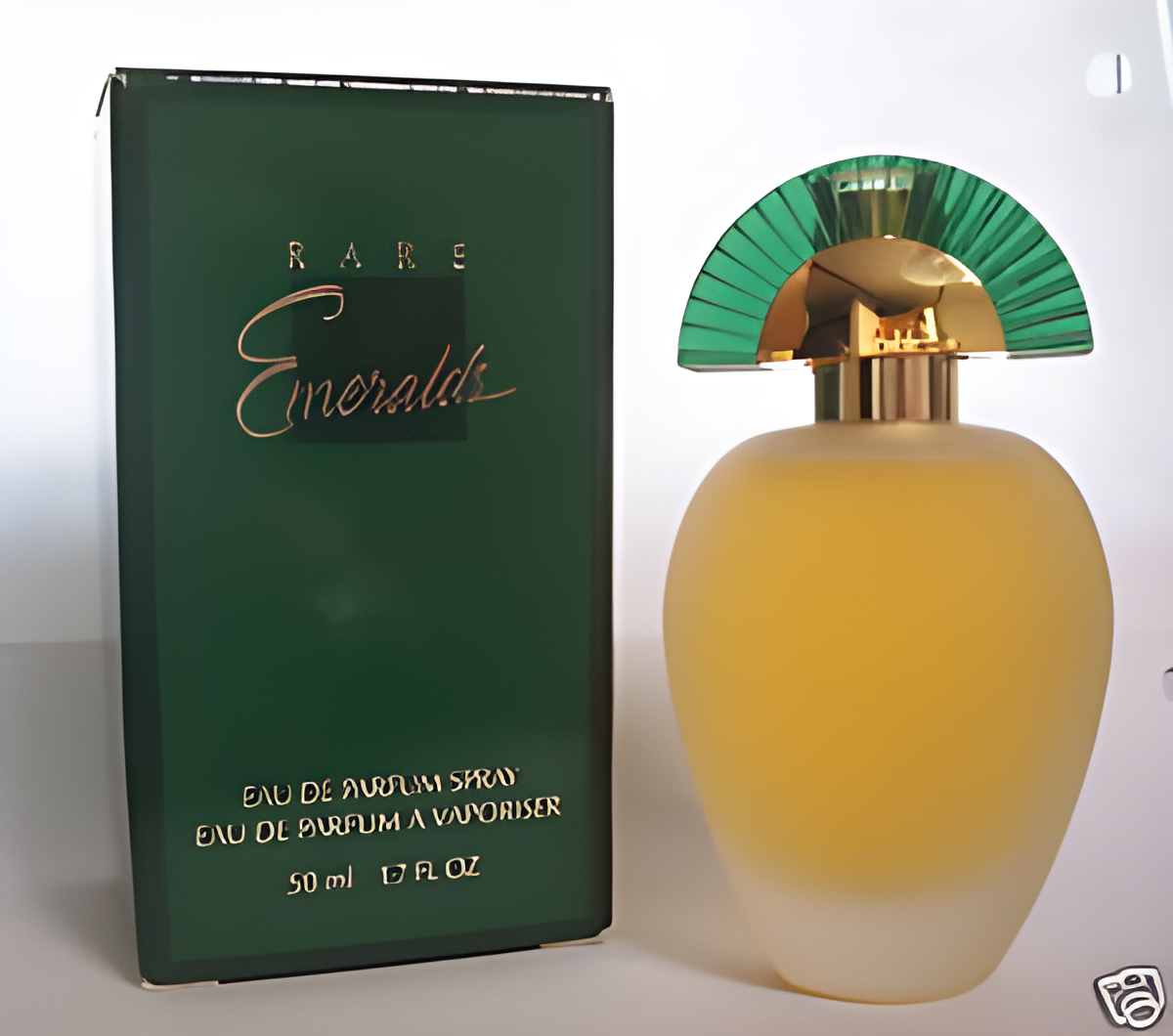 Rare Emeralds by Avon perfume bottle