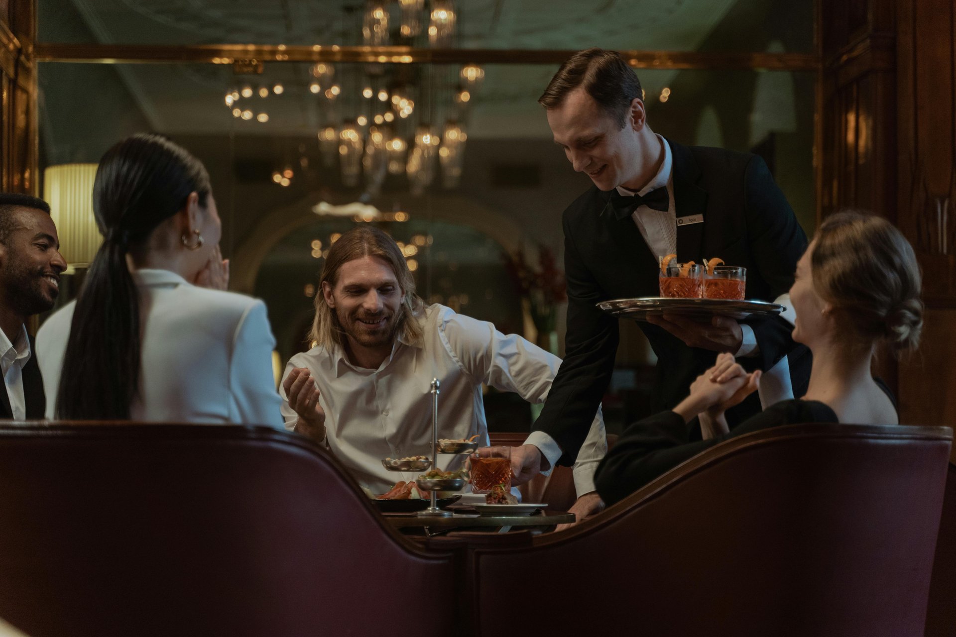 people-enjoying-themselves-in-a-fancy-restaurant